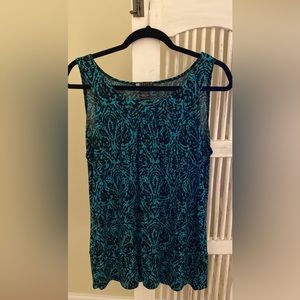 omen’s Carole Little lightweight pullover sleeveless top with scooped neck.